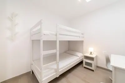 Cama o camas de una habitación en Bungalow Club Aguadulce 1