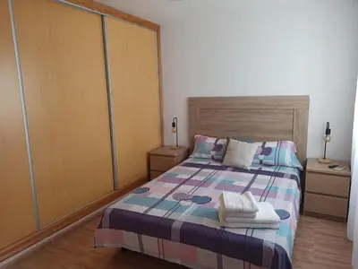 Cama o camas de una habitación en Increíble ático con vistas a la bahía de Almería