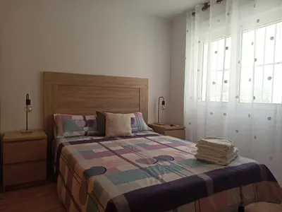 Cama o camas de una habitación en Increíble ático con vistas a la bahía de Almería