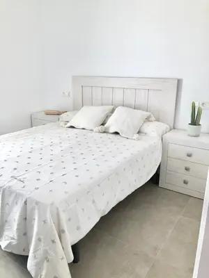 Cama o camas de una habitación en Apartamento en Mojácar en 1° línea de playa