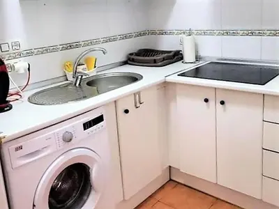 Una cocina o zona de cocina en Duplex in Urb Naturista near Beach & Pool