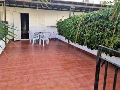 Un balcón o terraza de Duplex in Urb Naturista near Beach & Pool