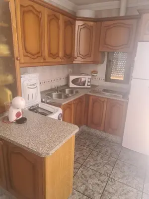 Una cocina o zona de cocina en Apartamento Mari