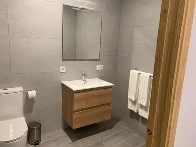Un baño de Alojamientos Tía María