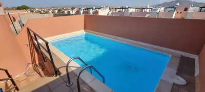 Piscina en o cerca de Homes of Spain, Apartamentos Paraiso, Ed Palmerston, Atico J a pie de Playa, piscina privada en solárium, WI-FI