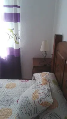 Cama o camas de una habitación en APARTAMENTO ANTONIA 1