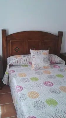 Cama o camas de una habitación en APARTAMENTO ANTONIA 1