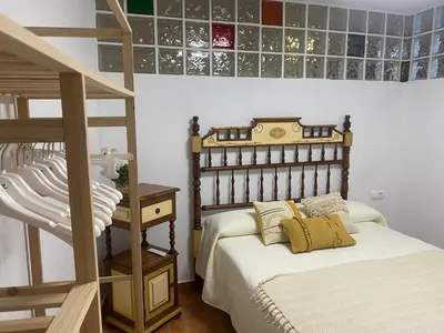 Cama o camas de una habitación en CASA DEL PEZ Vivienda a pie de calle en Agua Amarga a 250 metros de la playa