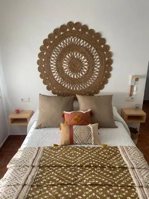 Cama o camas de una habitación en CASA DEL PEZ Vivienda a pie de calle en Agua Amarga a 250 metros de la playa