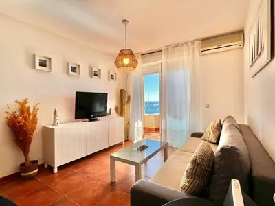 Una televisión o centro de entretenimiento en Apartamento Las vistas Piso