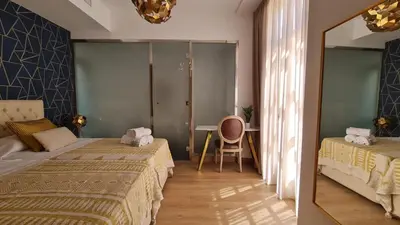 Cama o camas de una habitación en Expoholidays - Plaza Vieja con PARKING gratis