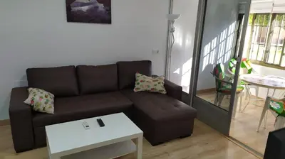 Zona de estar de Coqueto apartamento con terraza en la playa