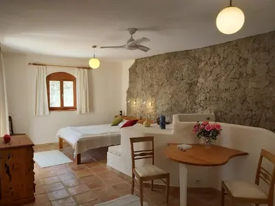 Cama o camas de una habitación en Cortijo El Molino Apartamento