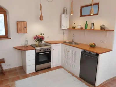 Una cocina o zona de cocina en Cortijo El Molino Apartamento