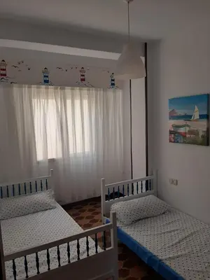 Cama o camas de una habitación en Las Palmeras 1
