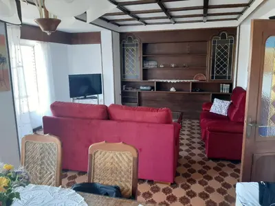 Una televisión o centro de entretenimiento en Las Palmeras 1
