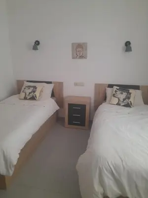 Cama o camas de una habitación en Casa sol y mar