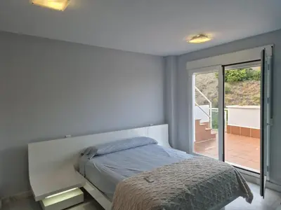 Cama o camas de una habitación en TRIPLEX DE LUJO EN MOJACAR