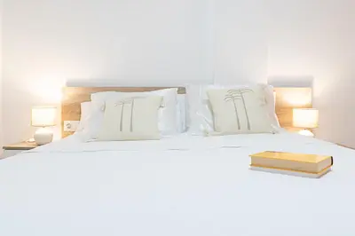 Cama o camas de una habitación en Salinas Mar y Playa