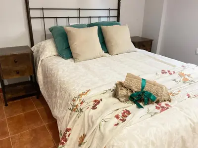 Cama o camas de una habitación en Casa de la Plaza