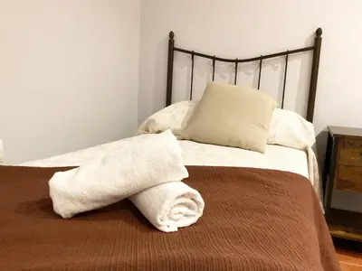Cama o camas de una habitación en Casa de la Plaza