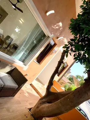 Zona de estar de AMPLIA VIVIENDA NEW para12 pers a 4 min caminando de PLAYA con Terraza, Piscina Com, Wifi, Ventiladores de techo, Lavavajillas