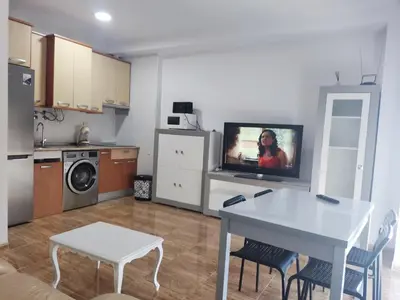 Una cocina o zona de cocina en Apartamentos a 300 metros playa