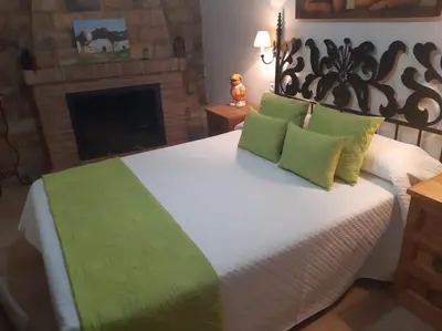 Cama o camas de una habitación en Casa Cueva Soledad