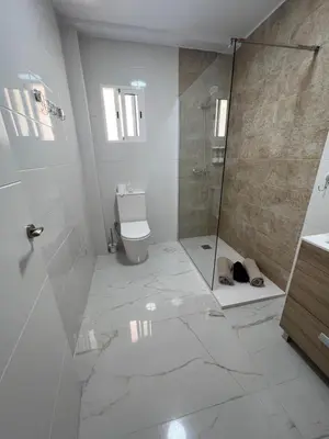 Un baño de Fabuloso apartamento,1a línea de playa a estrenar.