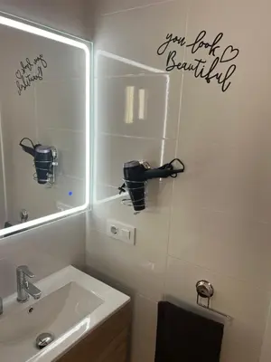 Un baño de Fabuloso apartamento,1a línea de playa a estrenar.