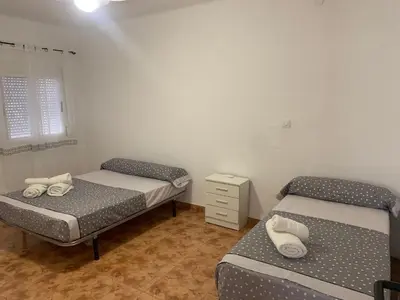 Cama o camas de una habitación en Casa Retamica