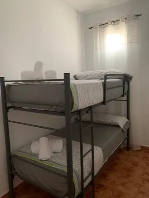 Cama o camas de una habitación en Casa Retamica