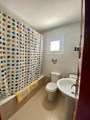 Un baño de Jardines Tropicales vera playa