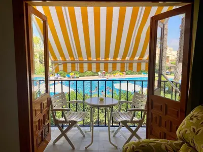 Piscina en o cerca de Jardines Tropicales vera playa