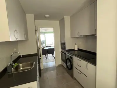 Una cocina o zona de cocina en Lovely New Luxery Beach Apartment in Mojacar Playa next to the best beach