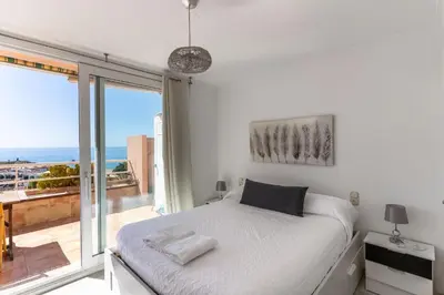 Cama o camas de una habitación en Expoholidays - Puerto Aguadulce (Av Carlos III 432 3ºI)