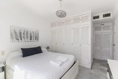 Cama o camas de una habitación en Expoholidays - Puerto Aguadulce (Av Carlos III 432 3ºI)