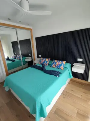 Cama o camas de una habitación en ÁTICO TERESA BORA PALM, PISCINA PRIVADA CLIMATIZABLE 250m playa