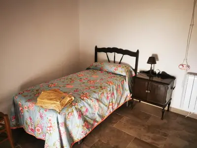 Cama o camas de una habitación en La Casa de los Pájaros