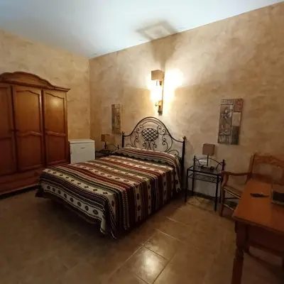 Cama o camas de una habitación en Hotel Azabache