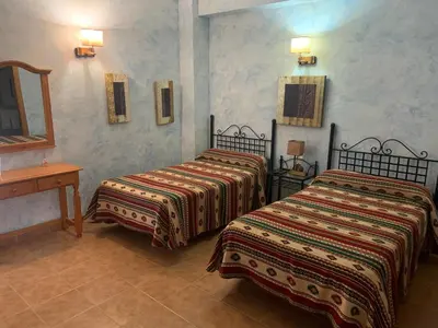 Cama o camas de una habitación en Hotel Azabache