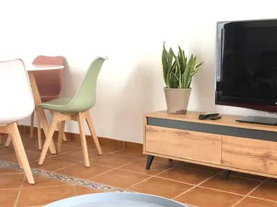 Una televisión o centro de entretenimiento en Mediterranean Sweet Home Mojacar