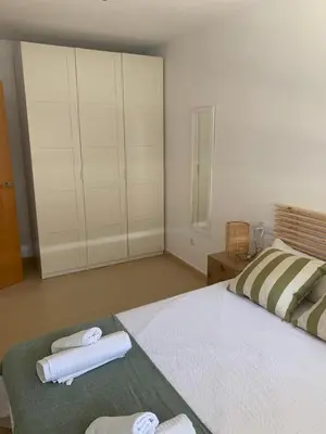 Cama o camas de una habitación en Precioso apartamento primera línea de playa