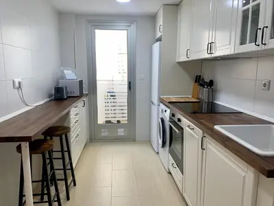 Una cocina o zona de cocina en Precioso apartamento primera línea de playa