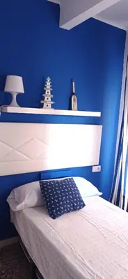 Cama o camas de una habitación en LA COLONIA PLAYA