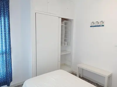 Cama o camas de una habitación en LA COLONIA PLAYA