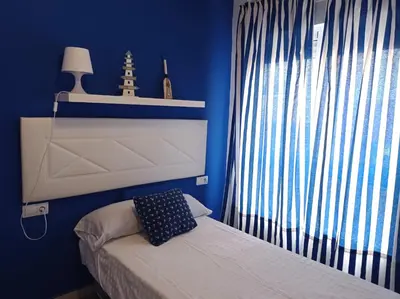 Cama o camas de una habitación en LA COLONIA PLAYA