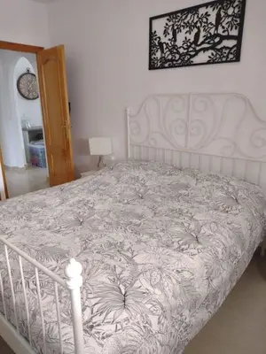 Cama o camas de una habitación en La Casa Arboleas