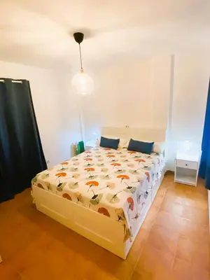 Cama o camas de una habitación en AMR Ático Los Atalayones
