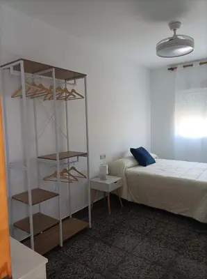 Cama o camas de una habitación en CORTIJO DEL LUCERO, FERNAN PEREZ